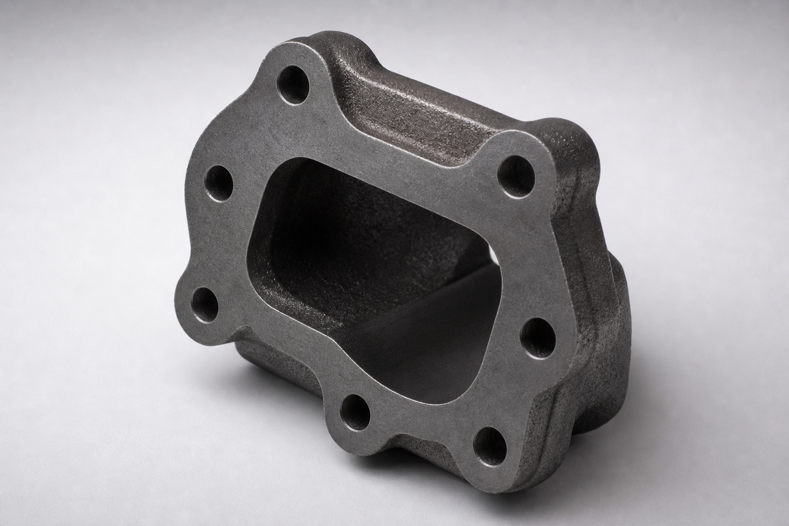 Adapter flange T4 (machined) — illustrative cast and machined component