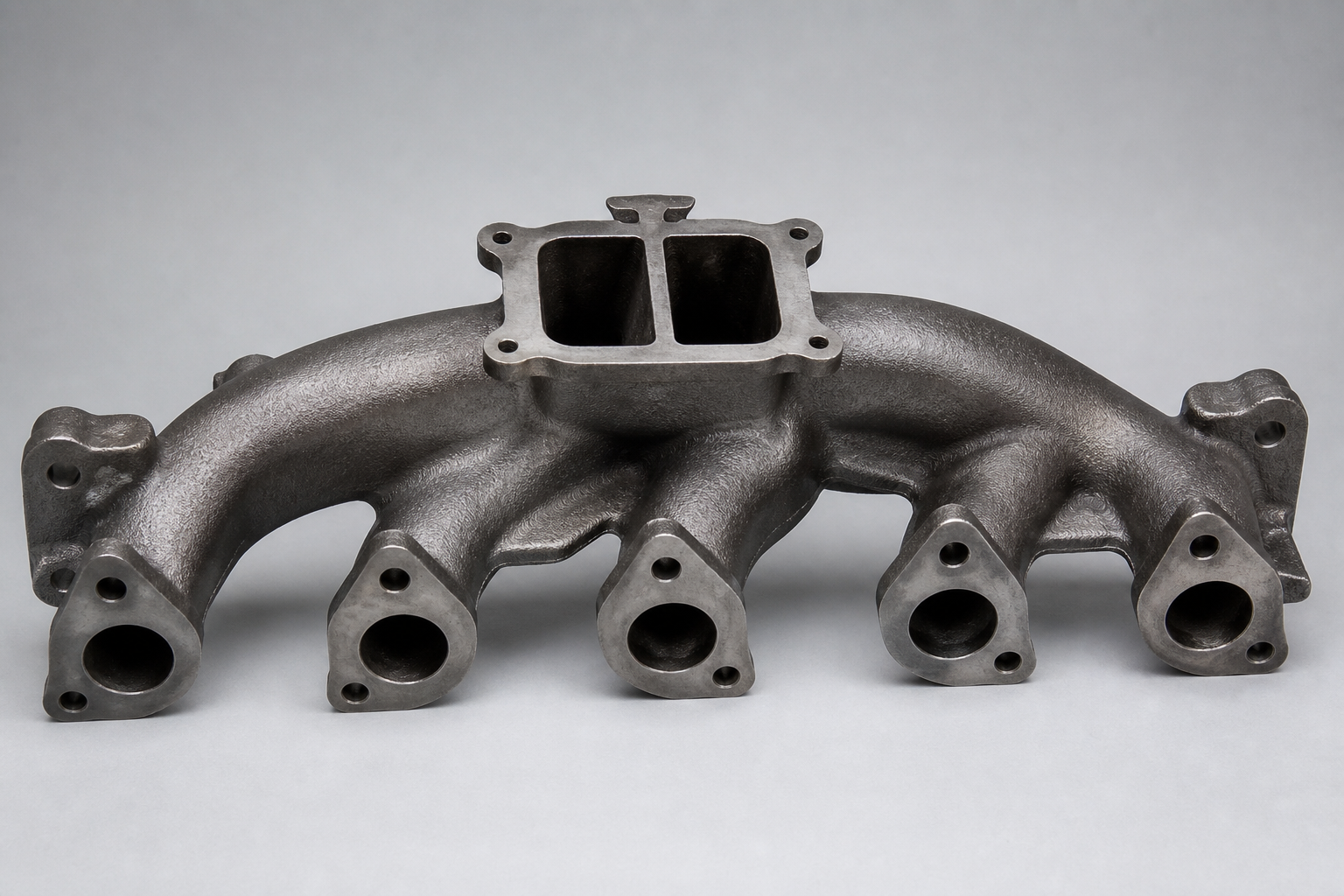 Manifold — illustrative cast and machined component