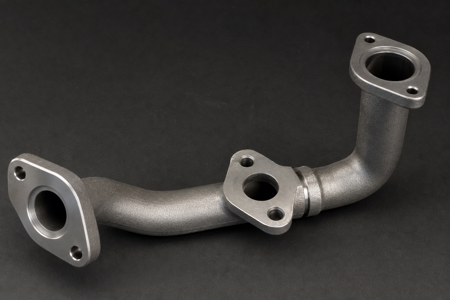 Oil piping — illustrative cast and machined component